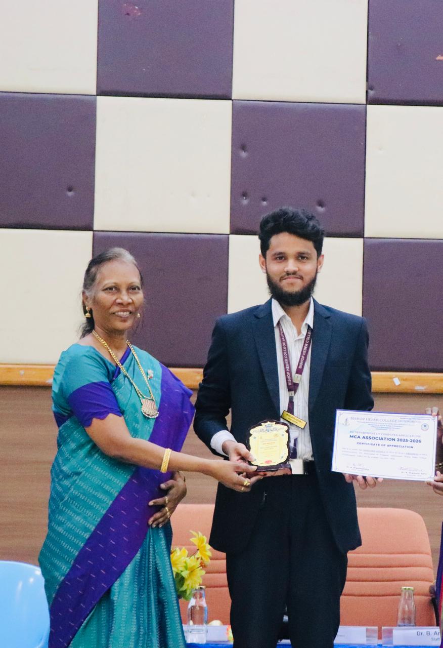 Receiving certificate of appreciation for leadership as MCA President